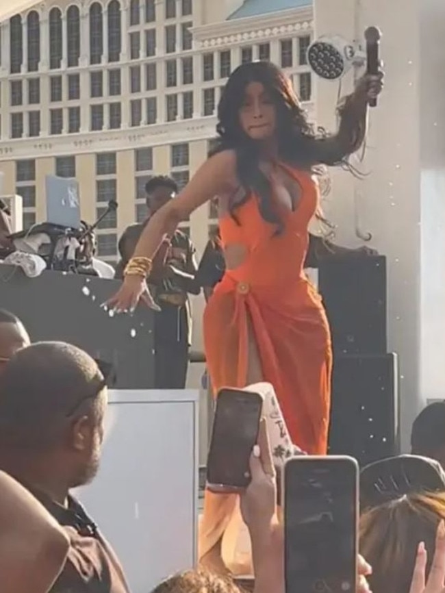 Cardi B hurled the microphone after a fan threw a drink at her. Picture: TikTok.