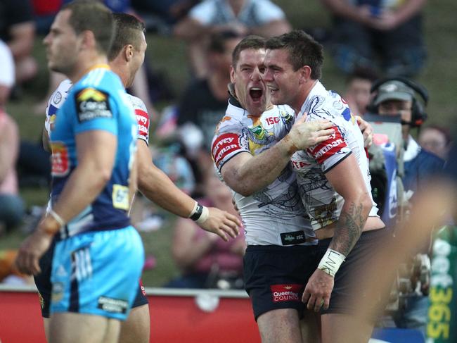 Kyle Feldt and Brent Tate during the Round 23 NRL match between the North Queensland Cowboys and the Gold Coast Titans at 1300SMILES Stadium.