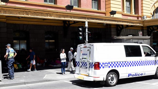 More police arrive at 2.08pm. Picture: Nicole Garmston