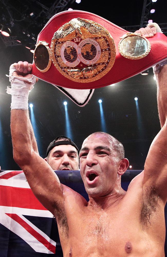 Australia’s Sam Soliman celebrates with the IBF world middleweight championship belt following his win on Sunday.