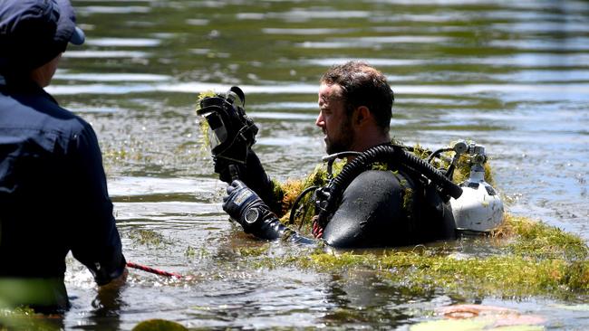 Police divers search Ross River at Riverway for missing person. Picture: Evan Morgan