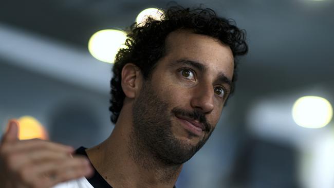 SINGAPORE, SINGAPORE - SEPTEMBER 19: Daniel Ricciardo of Australia and Visa Cash App RB looks on in the Paddock during previews ahead of the F1 Grand Prix of Singapore at Marina Bay Street Circuit on September 19, 2024 in Singapore, Singapore. (Photo by Rudy Carezzevoli/Getty Images)