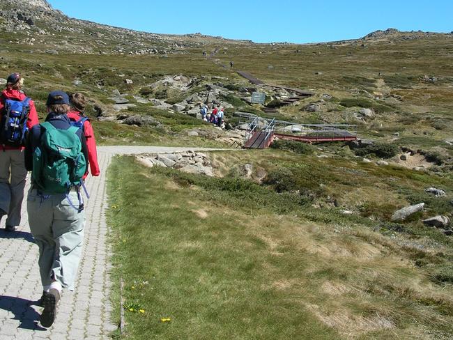 The Kosciuszko summit is a 13km, family-friendly walk from Eagle’s Nest. Picture: Philip Young