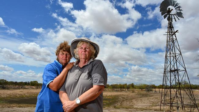 Deb Viney with her mum Frances Mary Viney at a dry dam on Janeville Station, 150km south of Praire. Picture: Evan Morgan