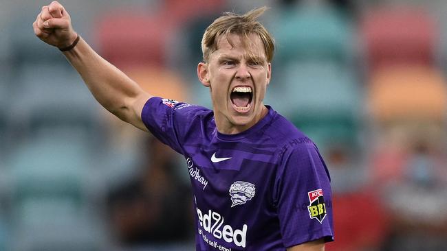 HOBART, AUSTRALIA - DECEMBER 24: Nathan Ellis of the Hurricanes celebrates the wicket of bowls of the Stars during the Men's Big Bash League match between the Hobart Hurricanes and the Melbourne Stars at Blundstone Arena, on December 24, 2021, in Hobart, Australia. (Photo by Steve Bell/Getty Images)