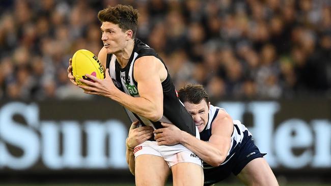 Pies forward Brody Mihocek has a crucial role to bring the ball to ground for the small forwards. Picture: Getty Images