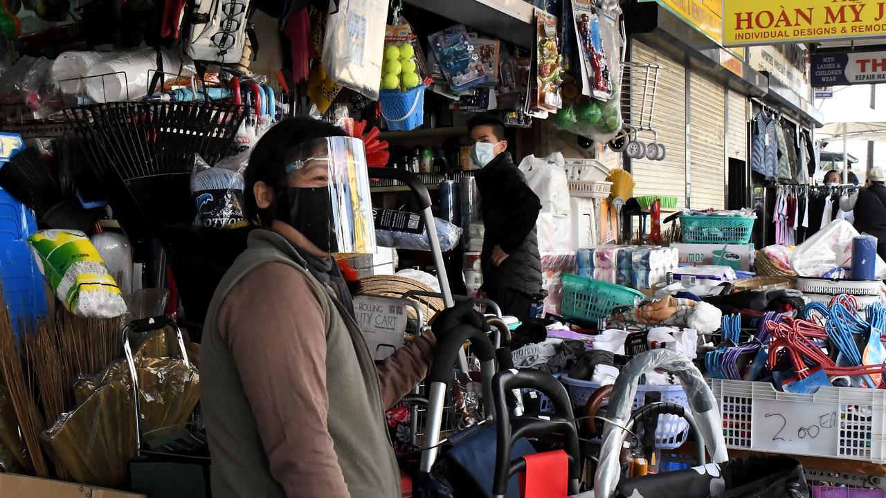 These images show a retailers and customers in the Old Town Centre at Bankstown on Monday morning conducting business despite the lockdown. Picture: Matrix Media.