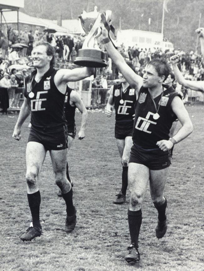 Devonport’s Mark Baker and Chris Fagan do a lap of honour with the cup after the 1988 grand final between Devonport and Glenorchy at North Hobart.