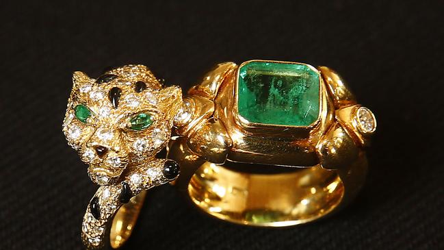 Diamond, emerald and enamel ring by Piajet and a diamond and emerald ring from Tony White. Picture: John Appleyard