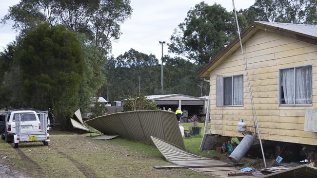 And plenty of residents were out today repairing fences and bits of their property. Picture: Melvyn Knipe