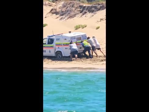 WA Cops bogged on the beach... again