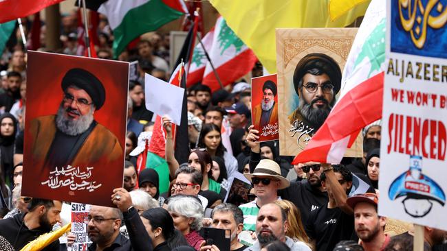 Demonstrators pictures of Hassan Nasrallah, the late leader of the Lebanese group Hezbollah, at a protest rally in Sydney. Picture: NewsWire / Damian Shaw