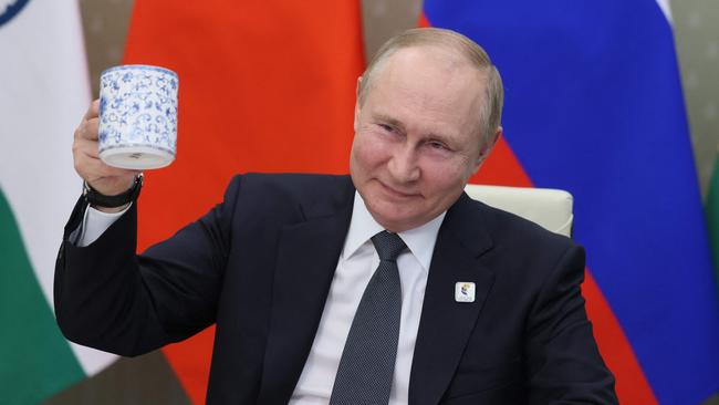 Russian President Vladimir Putin makes a toast during a video call in Moscow this week, as fears grow that Russia is learning from its early mistakes against Ukraine. Picture: AFP