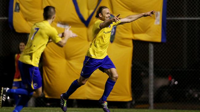 Martinero scores for Broadbeach in the 2014 grand final against Mudgeeraba. Picture: Scott Fletcher