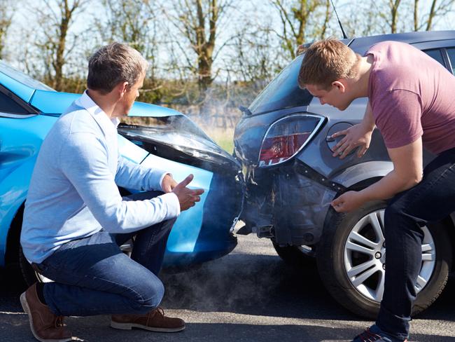 Two drivers arguing after the were involved in a car accident and had to make an insurance claim. Picture: iStock.