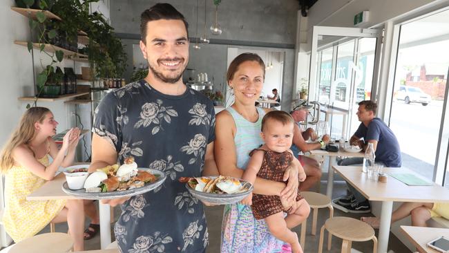 Owners Kaycee and Kelly Hapi with daughter Harlow shortly after opening Hymn Coffee 14 months ago. Photo by Richard Gosling