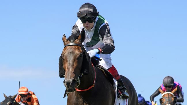 MELBOURNE, AUSTRALIA - FEBRUARY 24: Craig Williams riding Mr Brightside winning Race 7, the Lamaro's Hotel Futurity Stakes, during Melbourne Racing at Caulfield Racecourse on February 24, 2024 in Melbourne, Australia. (Photo by Vince Caligiuri/Getty Images)