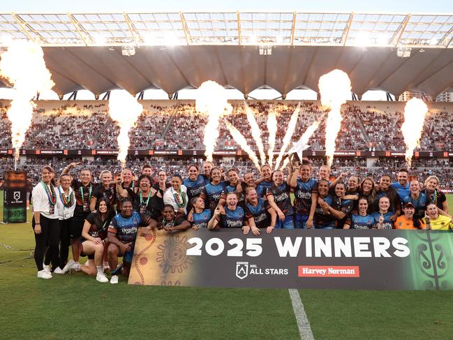 SYDNEY, AUSTRALIA - FEBRUARY 15: Indigenous All Stars players celebrate with the Fanning-Murphy Trophy after winning the Women's NRL All Stars match between Indigenous and Maori at CommBank Stadium on February 15, 2025 in Sydney, Australia. (Photo by Matt King/Getty Images)