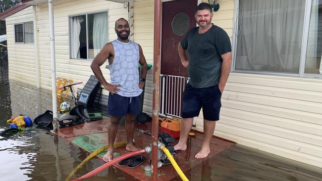 Francis Nahow and the man who saved his home from bushfires, Rob McPherson, on the porch of Mr Nahow’s home. Picture: Supplied