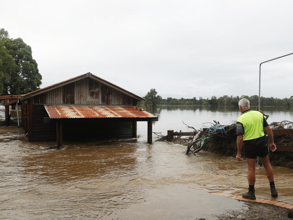 Camden a day after another flood in the area in two weeks .Phil Oliver ( cap) sevens damage on his property at 2 Exeter st Camden.