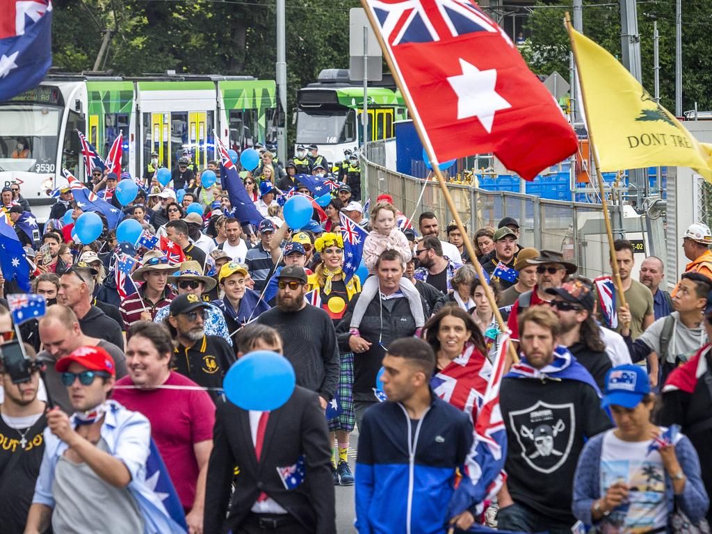 People didn’t wear masks at the rally. Picture: Jake Nowakowski