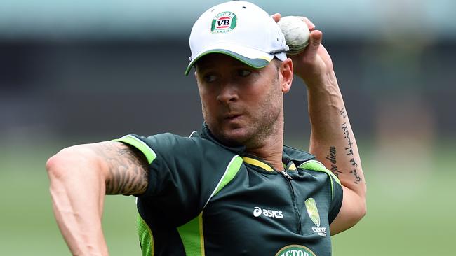 Australia's Michael Clarke returns the ball during a training session at the Melbourne Cricket Ground (MCG) on February 13, 2015. AFP PHOTO / Saeed KHAN --IMAGE RESTRICTED TO EDITORIAL USE - STRICTLY NO COMMERCIAL USE--