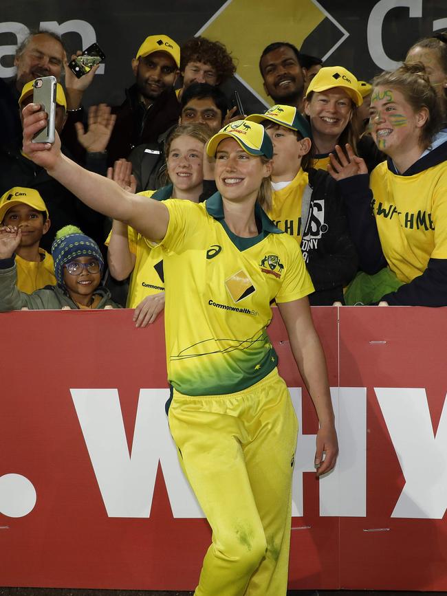 Ellyse Perry poses with fans at North Sydney Oval. Picture: Chris Pavlich