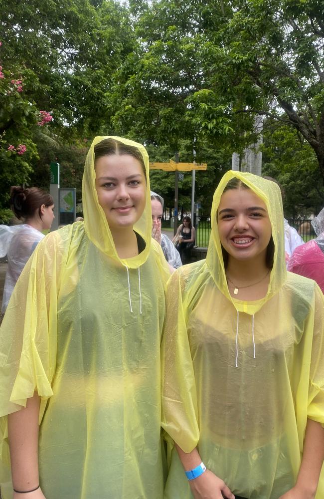 The girls brought ponchos to cope with the deluge. Photo: Rose Innes