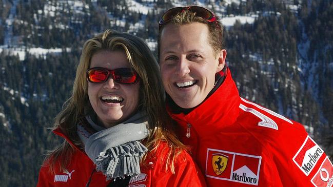 German Formula 1 driver Michael Schumacher poses with his wife Corinna, in the winter resort of Madonna di Campiglio, in the Dolomites area, Northern Italy, 11 January 2005. Schumacher takes part in the traditionnal Ferrari winter meeting with the press. AFP PHOTO / Press Ferrari / AFP PHOTO / FERRARI PRESS OFFICE / STR