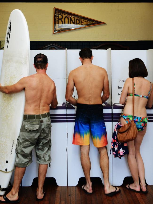 Voters at the Bondi Surf Bathers club polling booth in the seat of Wentworth on election day, September 7, 2013. Picture: Braden Fastier