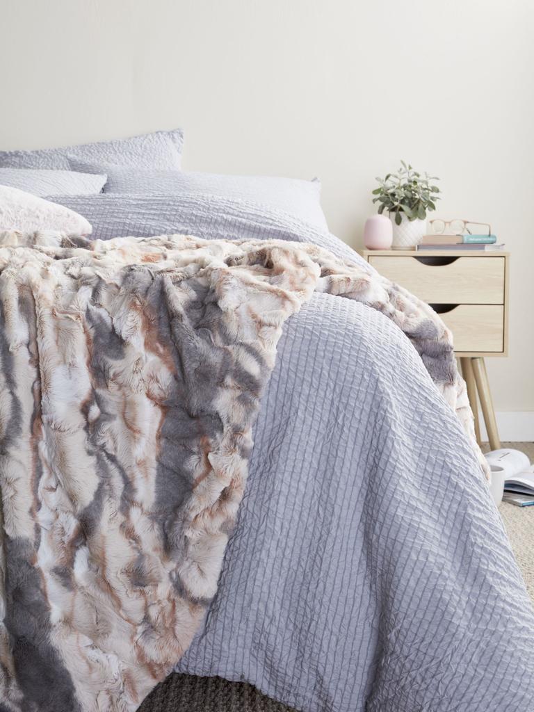 Keep warm with a range of quilt cover sets and throws.