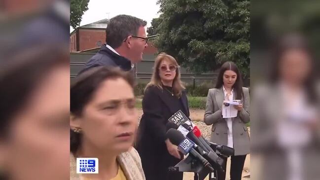 Dan Andrews heckled at press conference