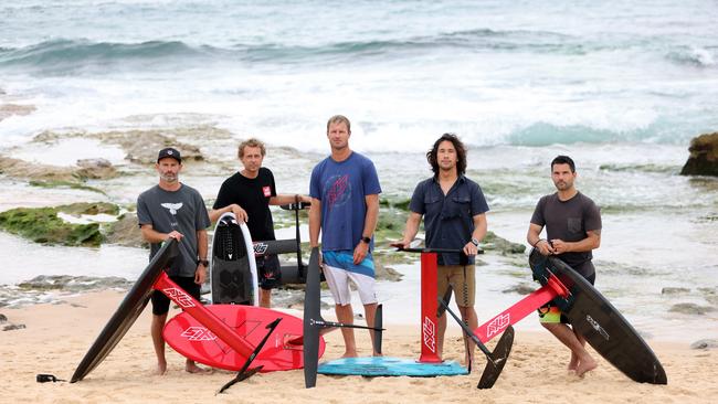 Hydrofoil surfers (L-R) Mario Lisbona, Jordan Gilbert, Jeremy Wilmotte, Joshua Ku and Jesmond Dubeau pictured at Maroubra Beach. Picture: Damian Shaw