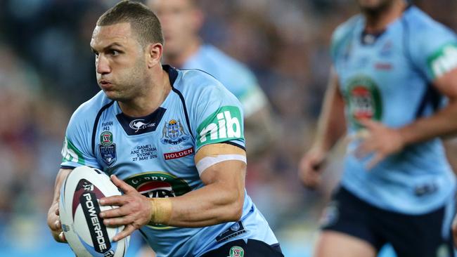 Robbie Farah during Game 1 of the 2015 State of Origin series between the NSW Blues and the Queensland Maroons at ANZ Stadium,Homebush .Picture Gregg Porteous