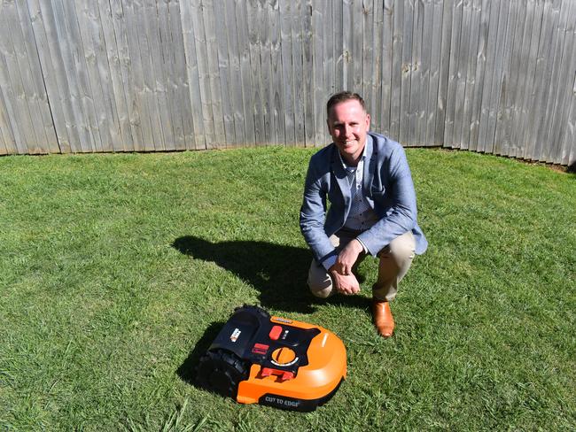 David Mills, GM of McGrath Ballina and Byron, with a model of the Landroid robot mower.