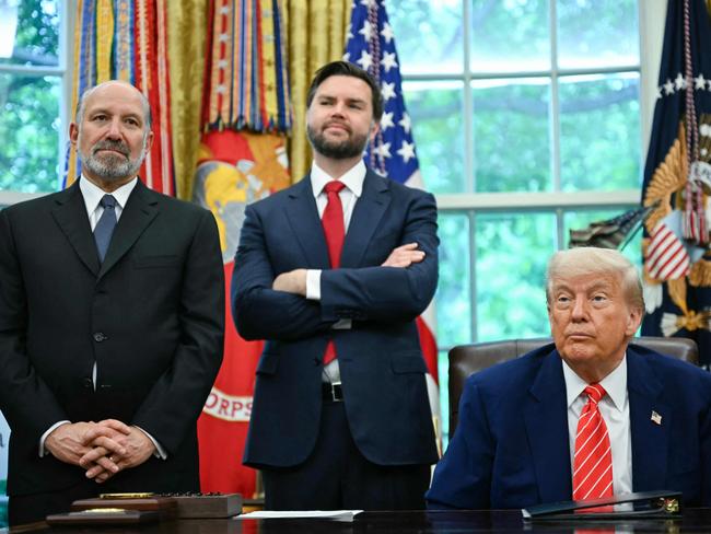 US President Donald Trump makes a trade announcement as Secretary of Commerce Howard Lutnick and Vice President JD Vance look on in the Oval Office of the White House on May 8, 2025. Picture: AFP