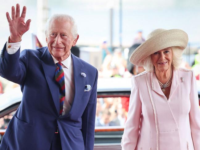 Britain's King Charles III and Britain's Queen Camilla arrive to meet members of the Welsh Parliament during a visit to commemorate the 25th anniversary of the Senedd, in Cardiff on July 11. Picture: AFP