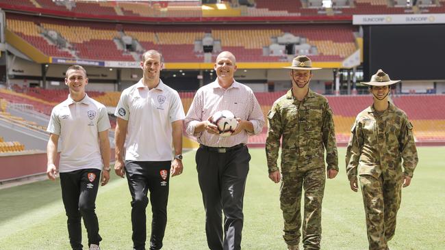 Roar major announcement around ANZAC Day fixture v Adelaide United. Dylan Wenzel- Halls, Luke DeVere, Troy Watson CEO mates4mates, WO2 Troy Perry and CFN Domonique Zabala. Pic taken at Suncorp Stadium. Pic Mark Cranitch.