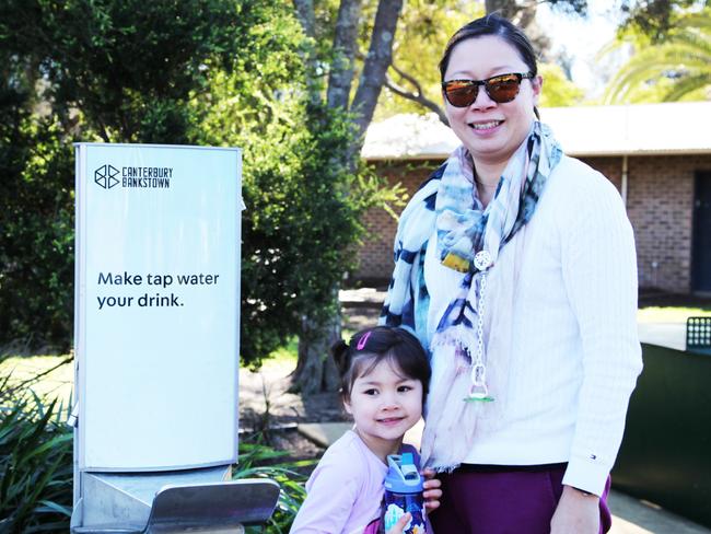 Bincy Low and daughter Sophie, 4, are regular users of the water refilling station.