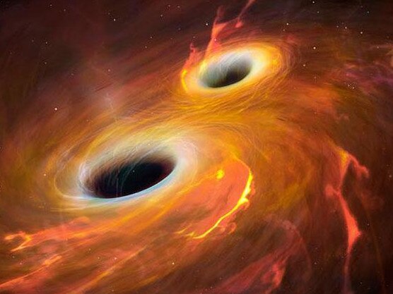 Physicists found signs of four death spirals between two black holes, hidden in data collected last year. Picture: Mark Garlick / Science Photo Library