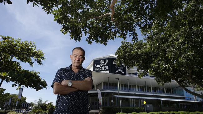 Man Overboard owner Rob Koch in front of the trees which obscure the Pier Marketplace PICTURE: ANNA ROGERS