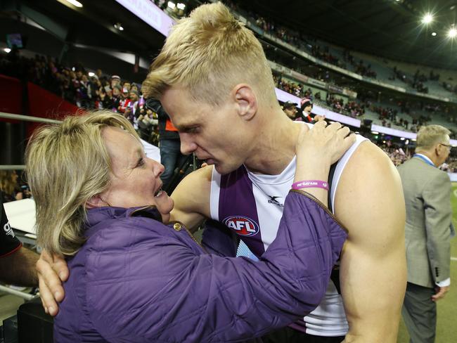 Fiona embraces her son Nick Riewoldt. Picture: Michael Klein