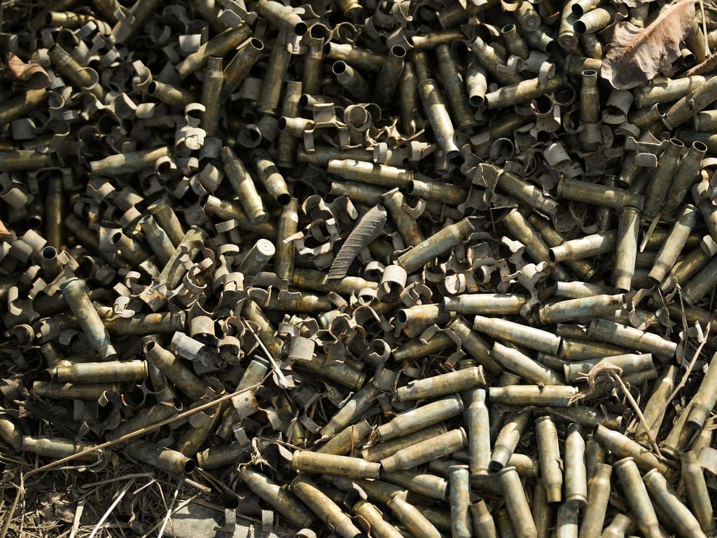 Used bullet casings are collected at a staging area near the border with Gaza in southern Israel. Picture: Getty Images