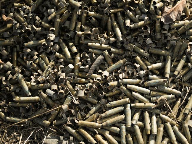 Used bullet casings are collected at a staging area near the border with Gaza in southern Israel. Picture: Getty Images