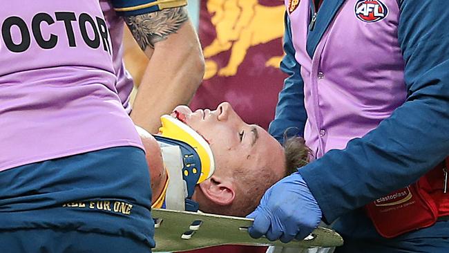 Harris Andrews was stretchered from the ground and ended up in hospital after his clash with Jeremy Cameron. Picture: Getty Images