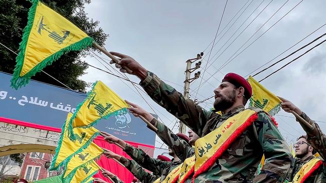 Fighters of the Lebanese Shiite group Hezbollah parade during a ceremony to commemorate the party's fallen leaders in the Lebanese village of Jibchit.