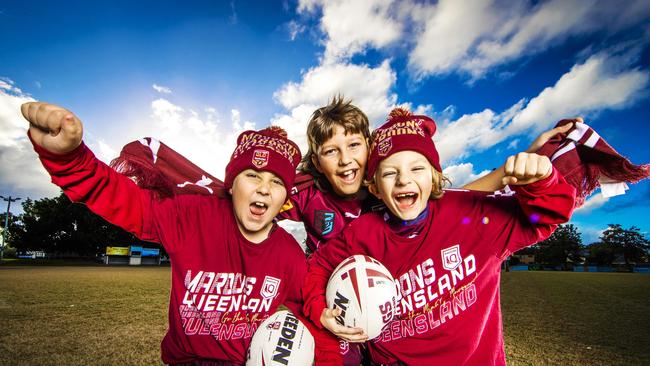 Burleigh Bears junior rugby league players Under 8 Tom McAllister, Under 11 Max Miller (tall with mullet) and Under 8 Jack Miller are pumped for Origin and talking verbatim about what needs to happen for Maroons to win Game 3. Picture: Nigel Hallett