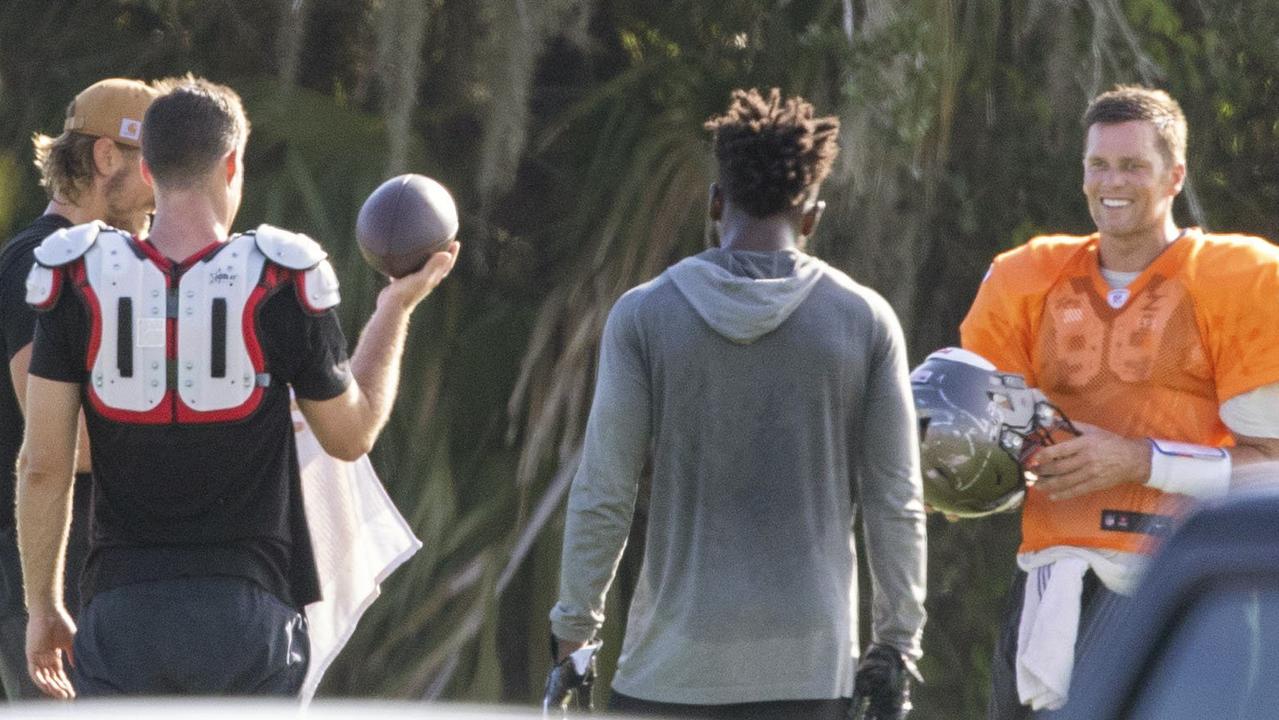 Tampa Bay Buccaneers NFL football quarterback Tom Brady, far right, is seen along with other players during a private workout. (Chris Urso/Tampa Bay Times via AP)