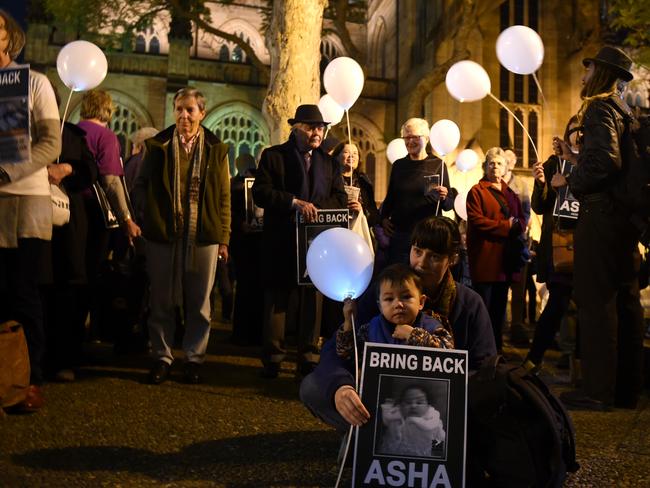 Protesters in Sydney take part in a rally against the relocation of children seeking asylum to offshore detention centres. Picture: AAP Image/Paul Miller