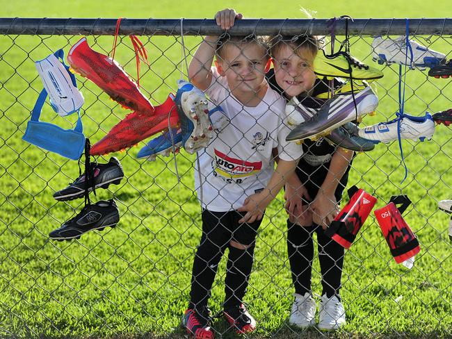 20/04/2015 Pirates Soccer Club has donated soccer boots and equipment to Northern Territory club Borroloola Cycolnes. Pirate juniors Jayden 6 and Mitchell 5 Crabb with some of the boots donated. Pic Mark Brake